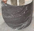 strange black flexible stone panel